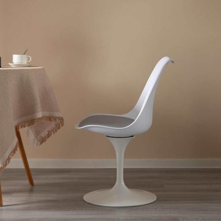 Side view of original Knoll Tulip Chair in light grey with pedestal base